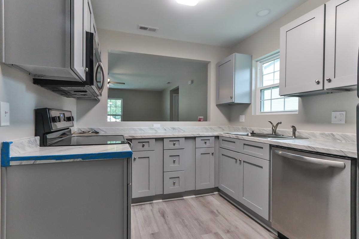 205 Plantation Road Myrtle Beach, SC 29588 - Photo 5 of 35 Kitchen with a wealth of natural light, stainless