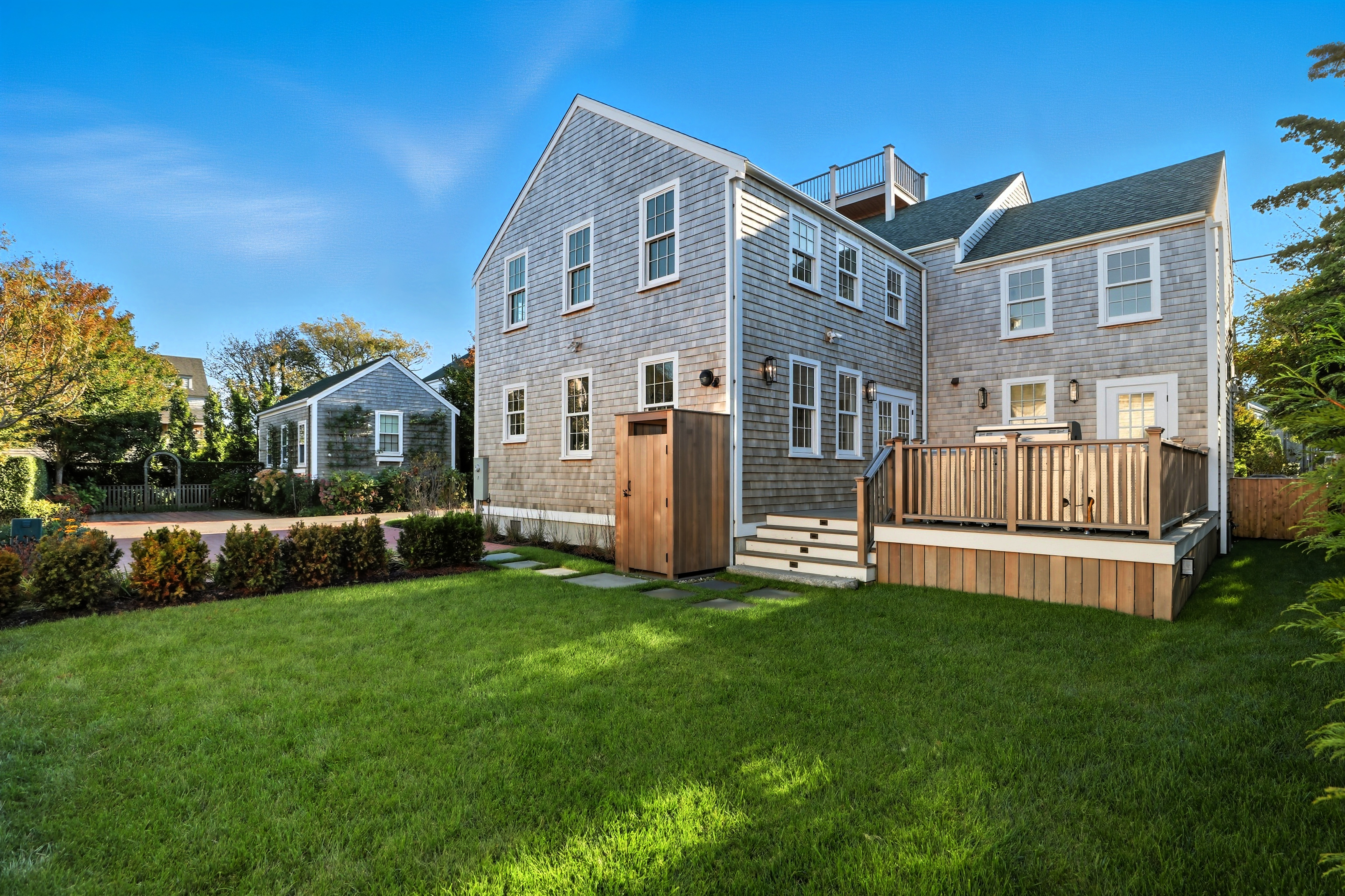 2 Mariner Way Nantucket, MA 02554 - Photo 32 of 34 a view of a house with a big yard and large trees