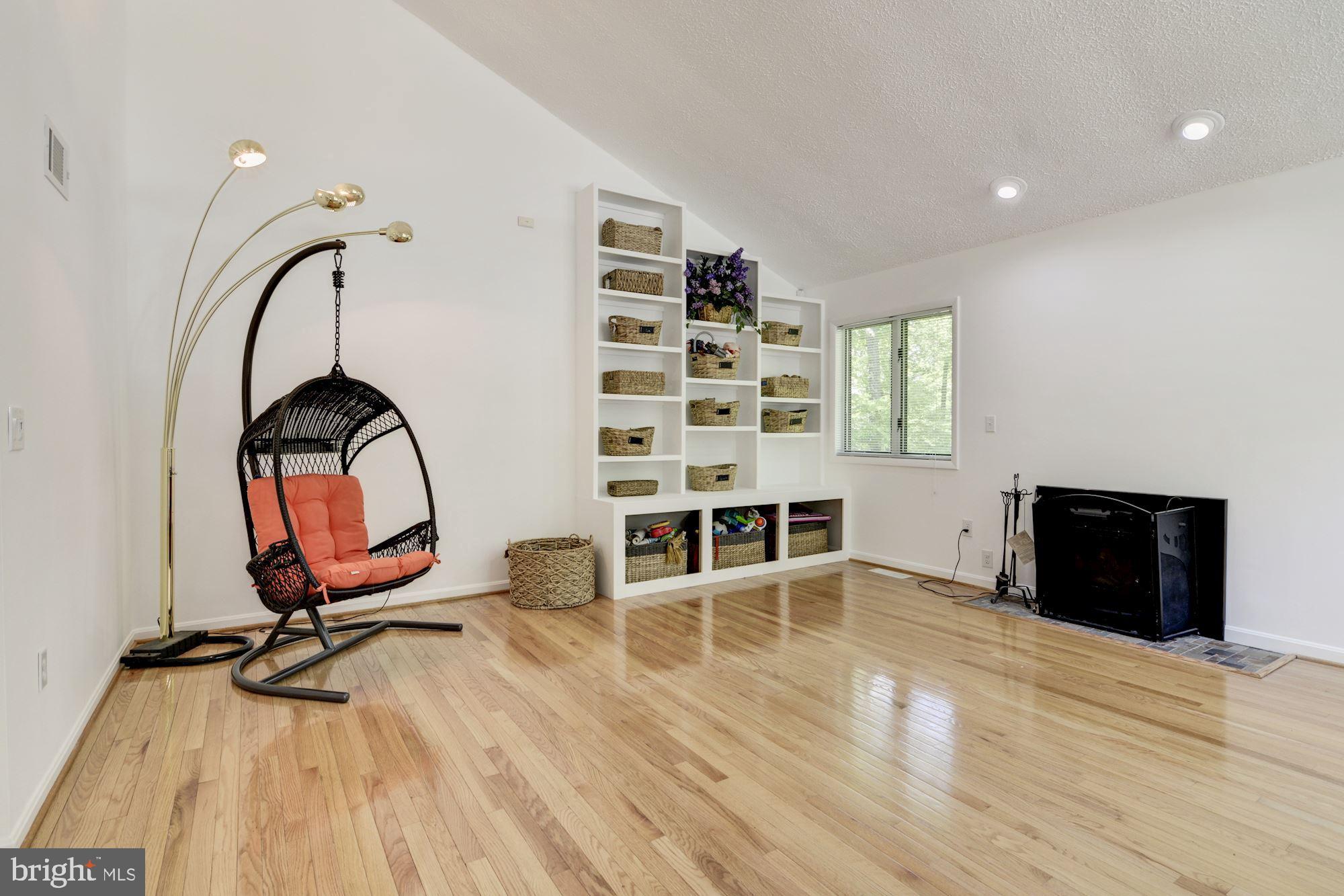 130 Claiborne Road Edgewater, MD 21037 - Photo 14 of 40 Built-In Shelving & Fireplace