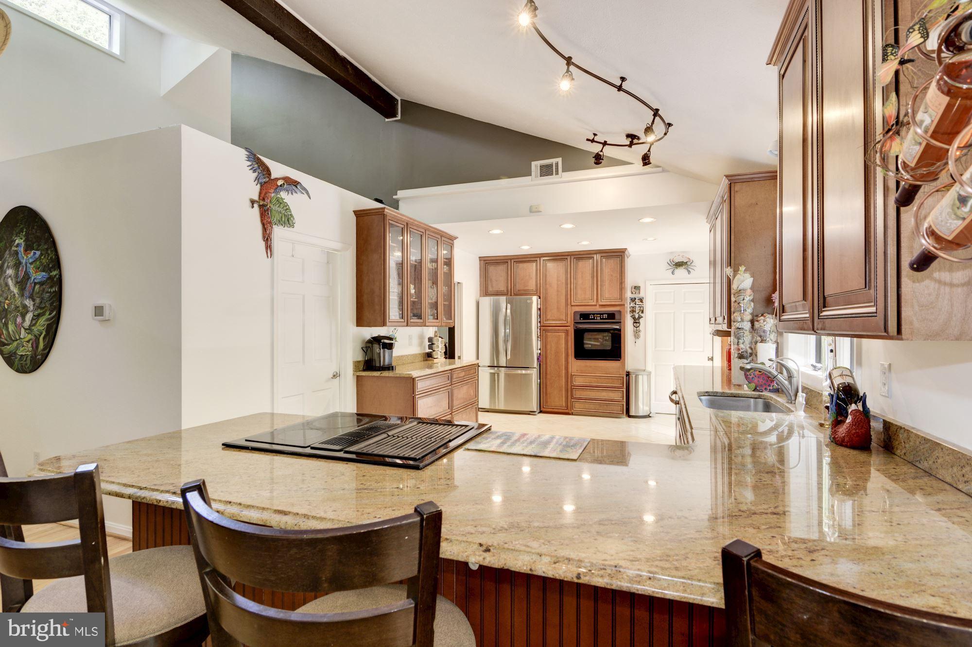 130 Claiborne Road Edgewater, MD 21037 - Photo 16 of 40 Impressive Eat-In Kitchen w/ Breakfast Bar