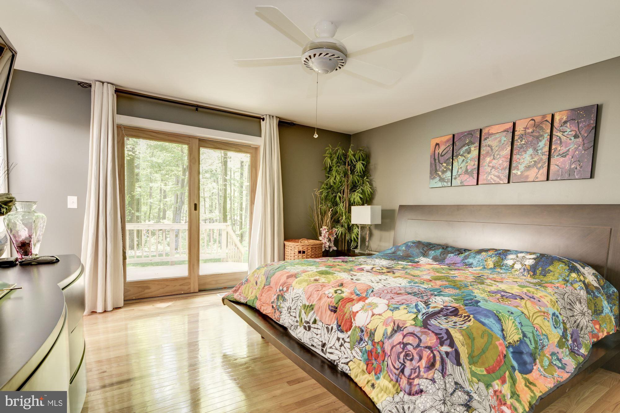 130 Claiborne Road Edgewater, MD 21037 - Photo 27 of 40 Master Bedroom w/ Slider to Deck