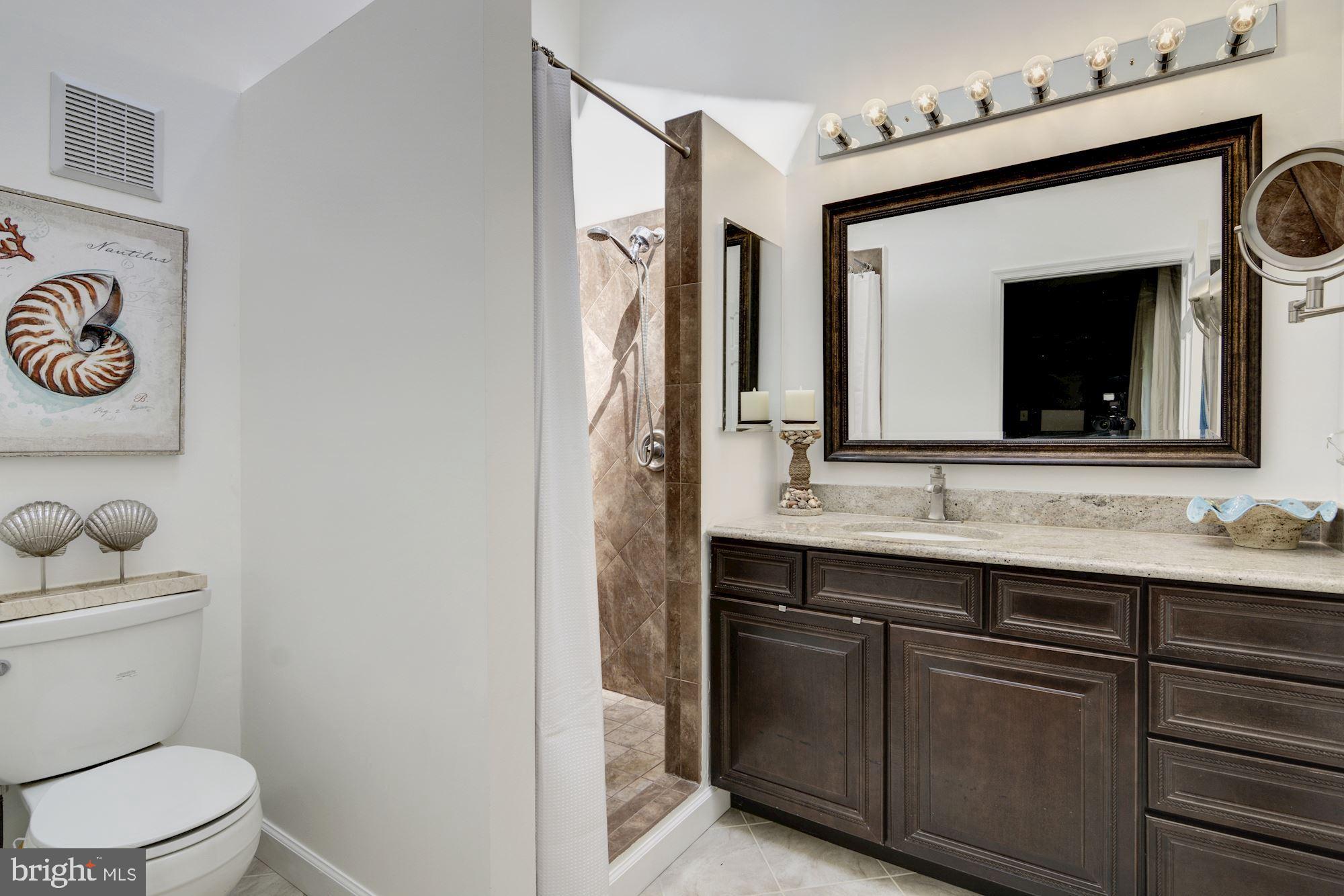 130 Claiborne Road Edgewater, MD 21037 - Photo 29 of 40 Attached Master Bathroom w/ Tile Shower