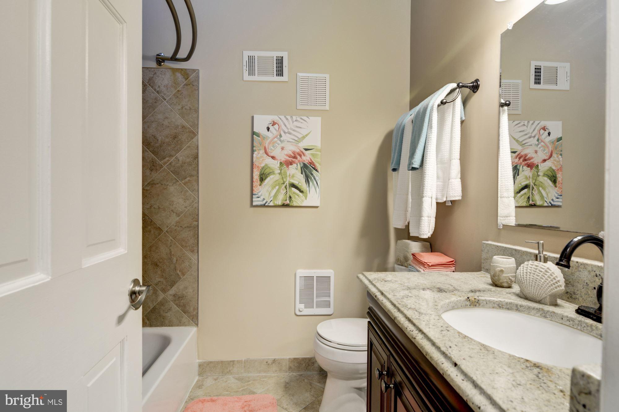 130 Claiborne Road Edgewater, MD 21037 - Photo 32 of 40 Hall Full Bathroom w/ Tile Shower & Granite Vanity