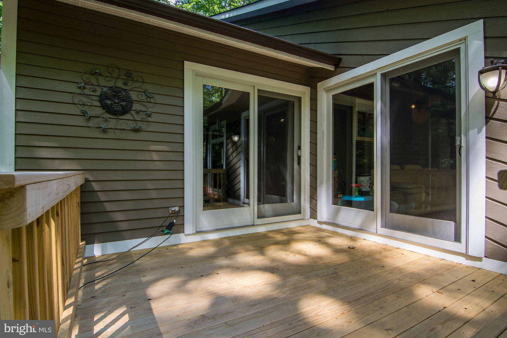 130 Claiborne Road Edgewater, MD 21037 - Photo 7 of 40 Sliders off Master Bedroom & Family Room to Deck