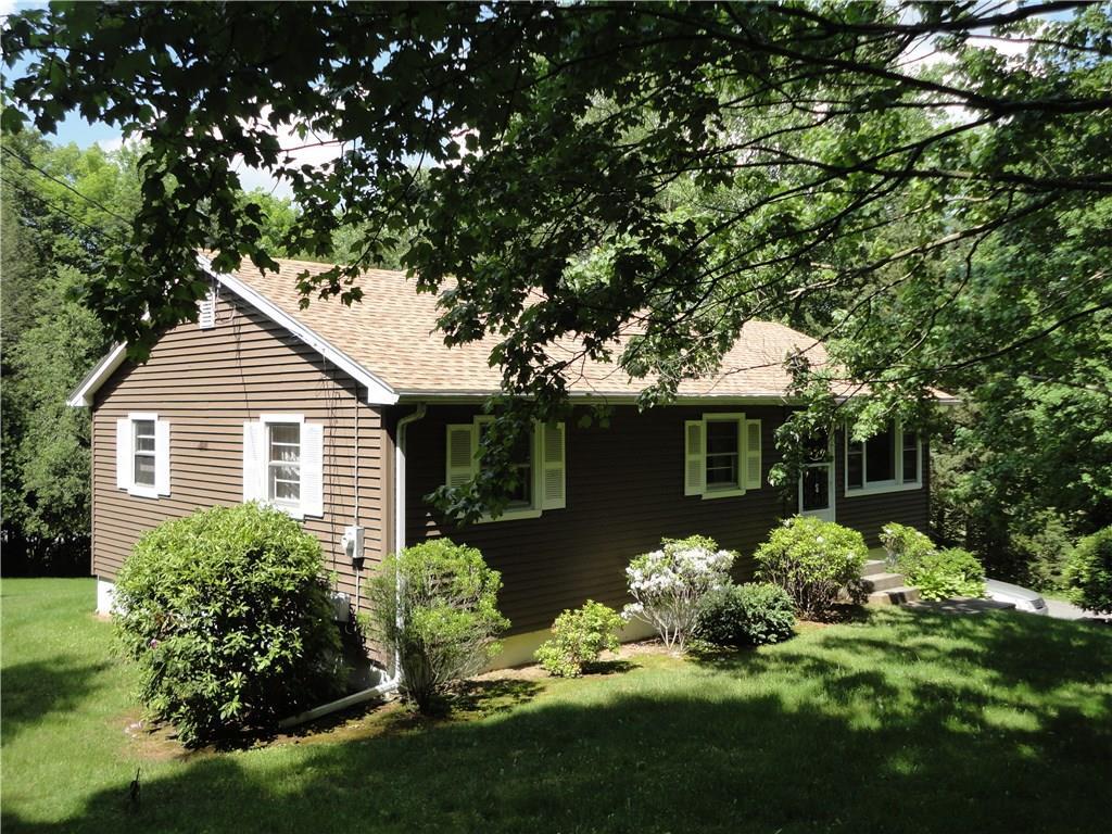 5 Bashon Hill Road Bozrah, CT 06334 - Photo 1 of 1 a front view of house with a garden