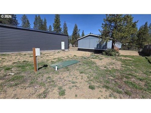 16125 Hawks Lair Road La Pine, OR 97739 - Photo 2 of 35 a black and white photo of a house