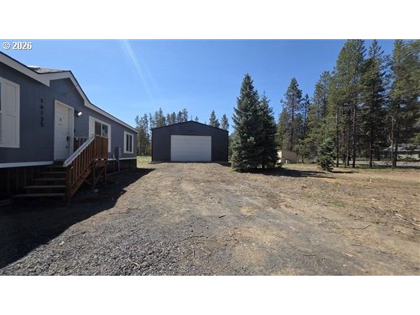 16125 Hawks Lair Road La Pine, OR 97739 - Photo 3 of 35 a black and white photo of a field