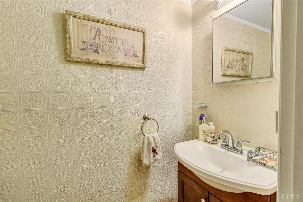 3101 Link Road, Unit 89 Lynchburg, VA 24503 - Photo 11 of 23 a bathroom with a sink and a mirror