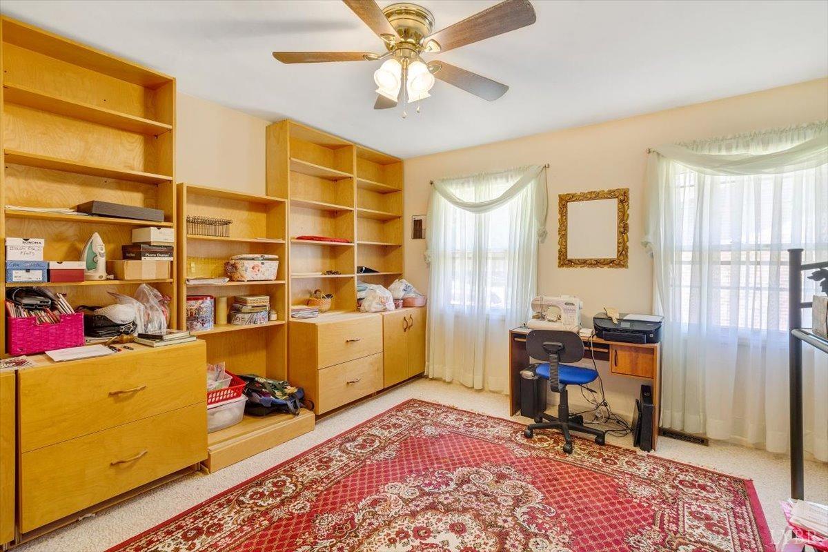 3101 Link Road, Unit 89 Lynchburg, VA 24503 - Photo 16 of 23 a view of a workspace with furniture and a window