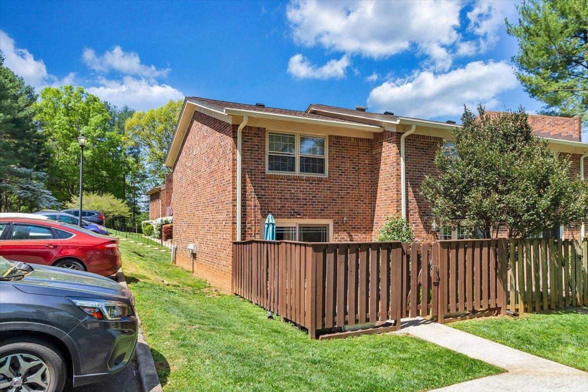 3101 Link Road, Unit 89 Lynchburg, VA 24503 - Photo 20 of 23 a front view of a house with a garden