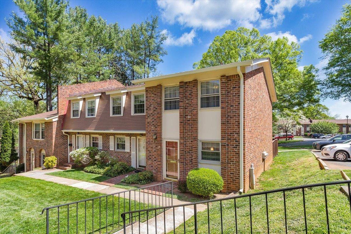 3101 Link Road, Unit 89 Lynchburg, VA 24503 - Photo 2 of 23 a view of a house with a yard and potted plants