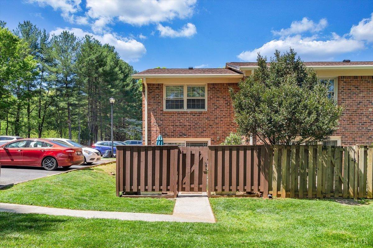 3101 Link Road, Unit 89 Lynchburg, VA 24503 - Photo 21 of 23 a view of a house with a yard