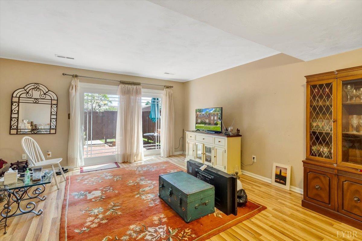 3101 Link Road, Unit 89 Lynchburg, VA 24503 - Photo 3 of 23 a living room with furniture and a flat screen tv