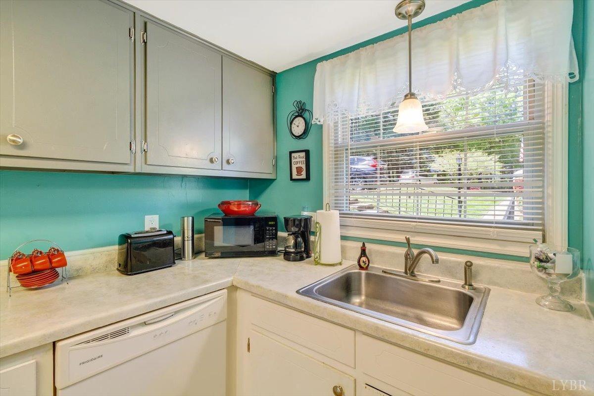 3101 Link Road, Unit 89 Lynchburg, VA 24503 - Photo 6 of 23 a kitchen with sink cabinets and a window