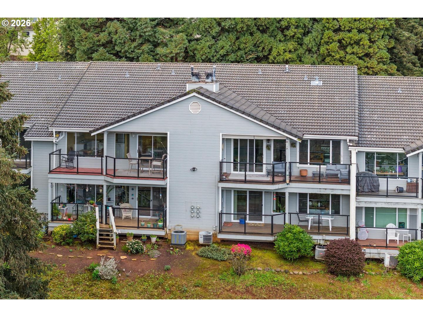 1840 Rees Hill Road Southeast, Unit 19 Salem, OR 97306 - Photo 25 of 34 a aerial view of a house with a yard