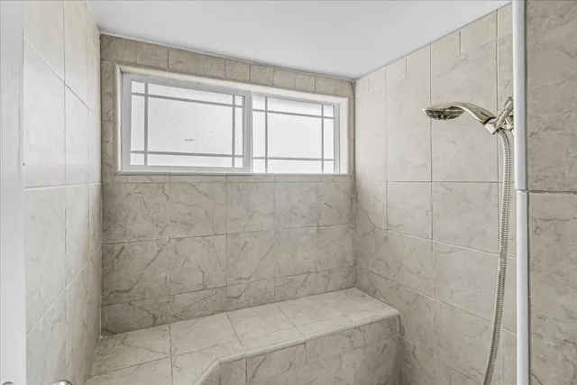 a bathroom with a sink a toilet and a bathtub