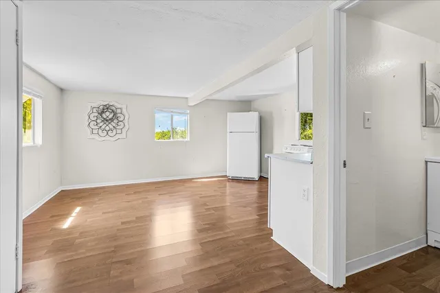 a bathroom with a sink a toilet and a shower