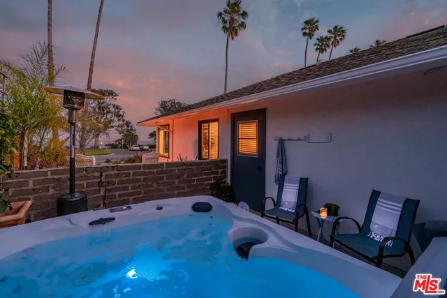 a front view of a house with patio