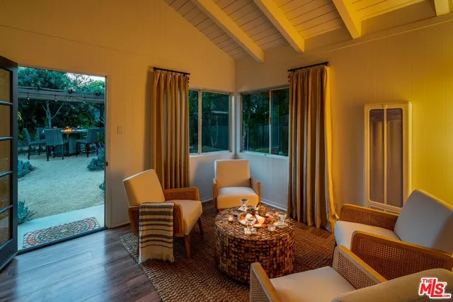 a outdoor living space with furniture and a window