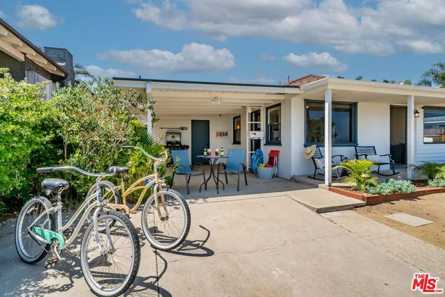 a view of multiple house with patio
