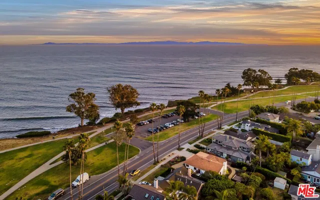a view of a city with an ocean