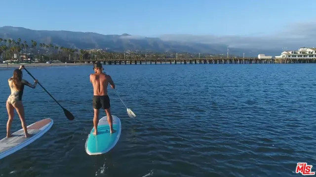 a view of a lake and mountain in the background