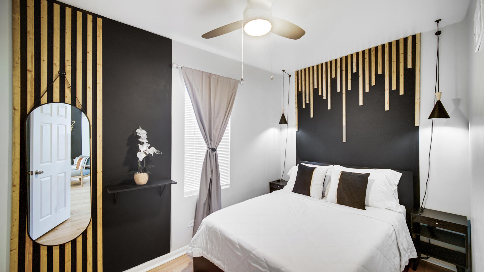 1422 Roberts Avenue Whiting, IN 46394 - Photo 17 of 29 a bedroom with a bed and a chandelier