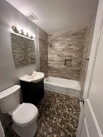 a view of a park and basketball court