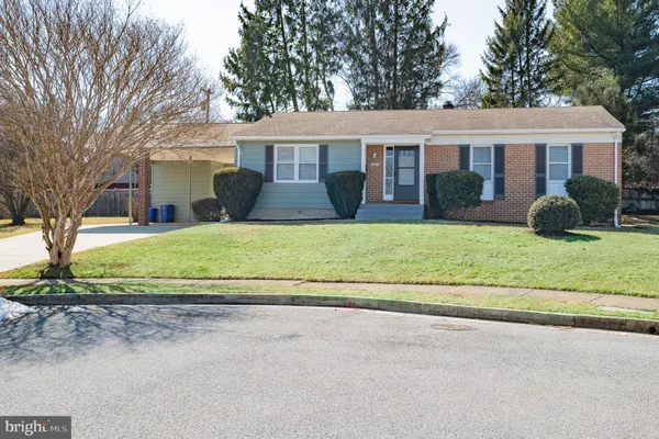 front view of a house and a yard