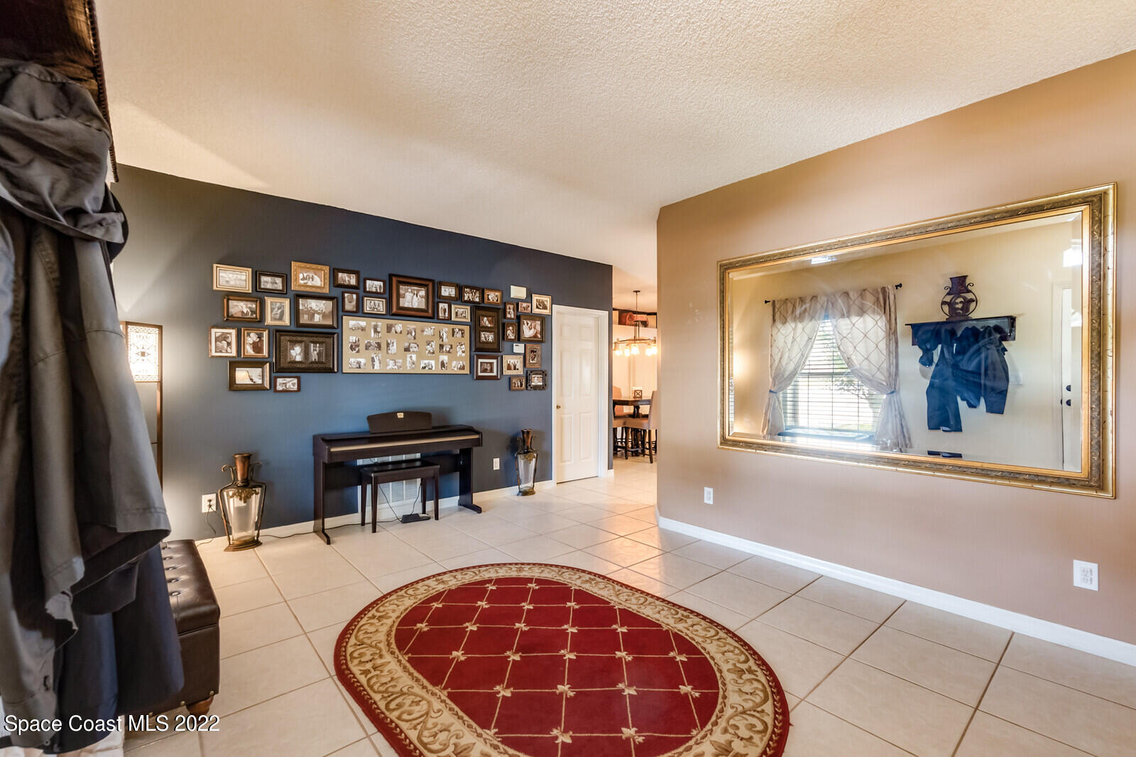 1936 Blue Ridge Avenue Melbourne, FL 32935 - Photo 11 of 35 a view of a livingroom with furniture and window