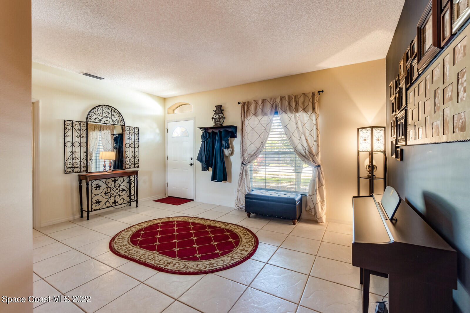 1936 Blue Ridge Avenue Melbourne, FL 32935 - Photo 13 of 35 a living room with furniture and a table