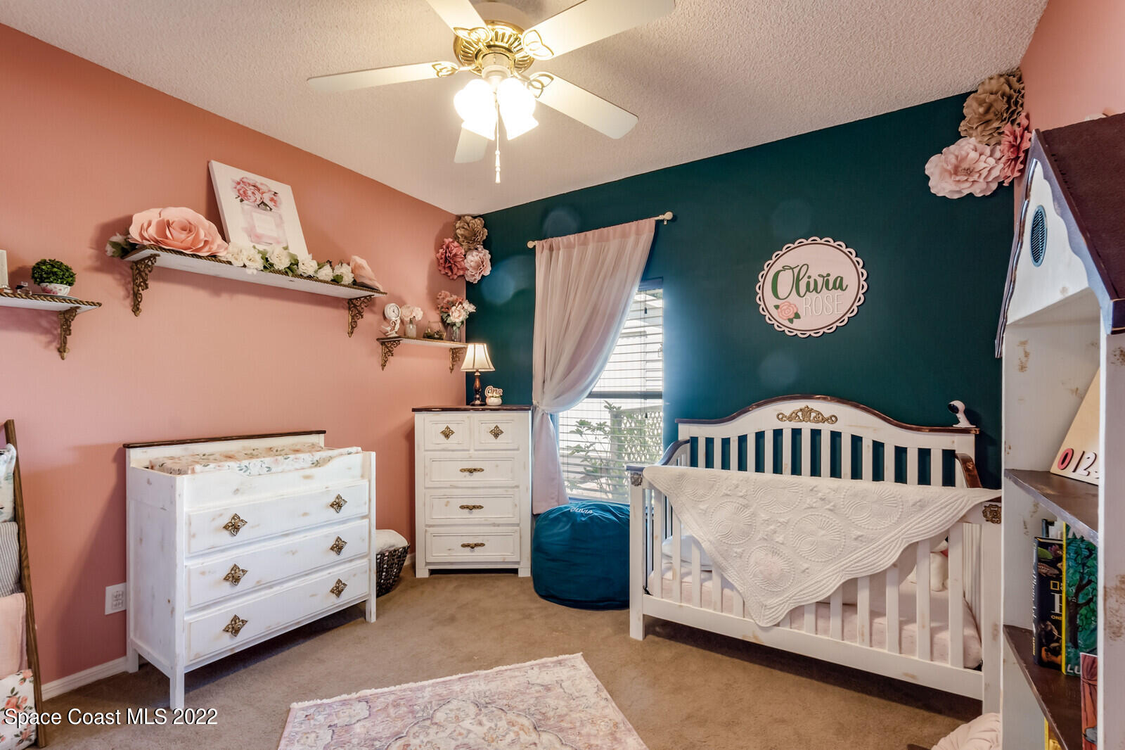 1936 Blue Ridge Avenue Melbourne, FL 32935 - Photo 33 of 35 a bedroom with furniture and a large window