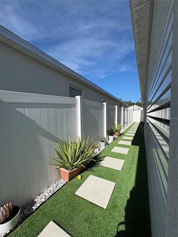 1948 Rankin Street Kissimmee, FL 34744 - Photo 19 of 37 a view of yard from a corridor