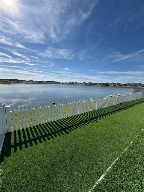 1948 Rankin Street Kissimmee, FL 34744 - Photo 25 of 37 a view of a golf course with a lake