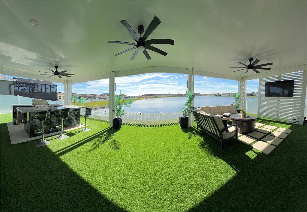 1948 Rankin Street Kissimmee, FL 34744 - Photo 28 of 37 a living room with chairs