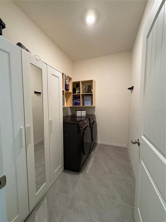1948 Rankin Street Kissimmee, FL 34744 - Photo 30 of 37 a view of kitchen with refrigerator and window