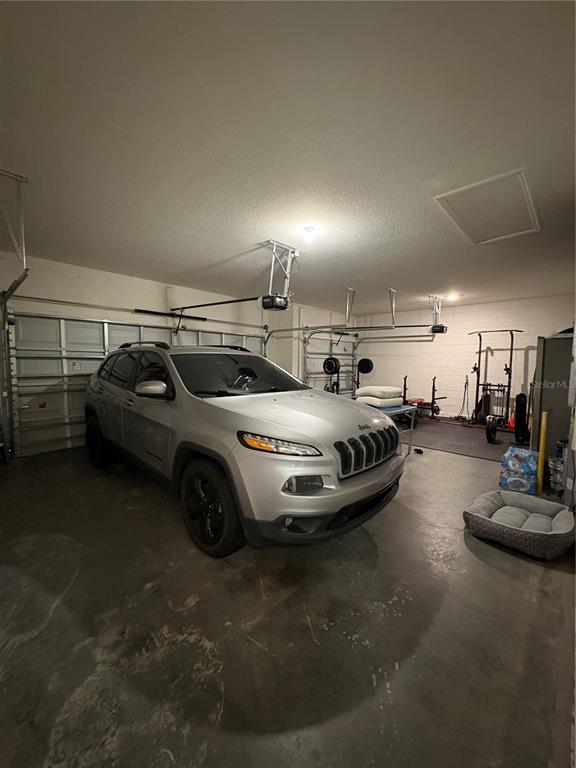 1948 Rankin Street Kissimmee, FL 34744 - Photo 9 of 37 a view of a car in garage