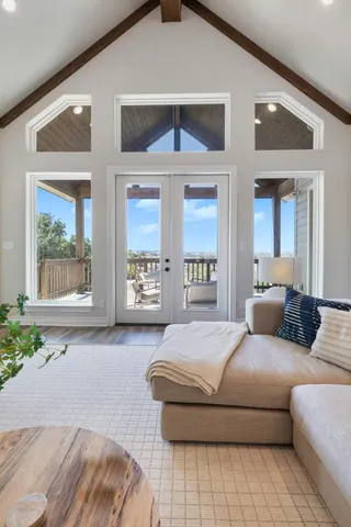 a bedroom with a large bed and a couch