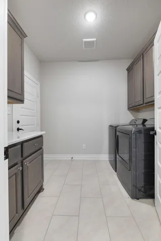 a view of cabinets with wooden floor
