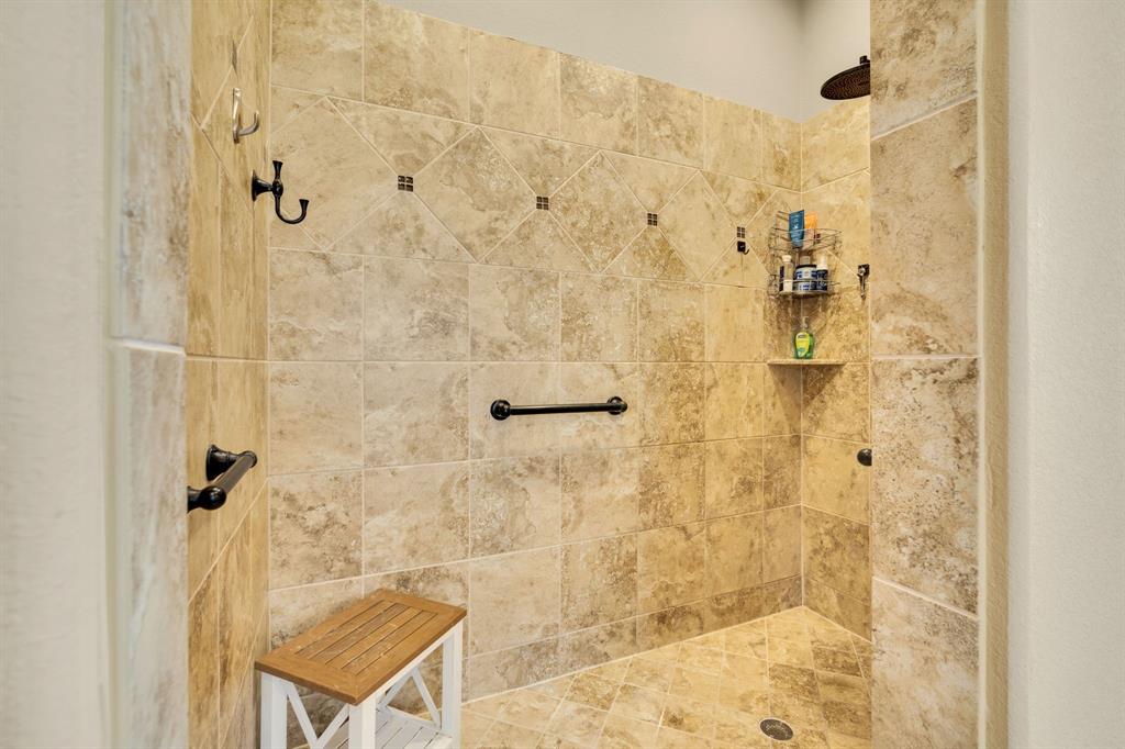 409 George Hopper Road Midlothian, TX 76065 - Photo 15 of 26 a bathroom with a shower