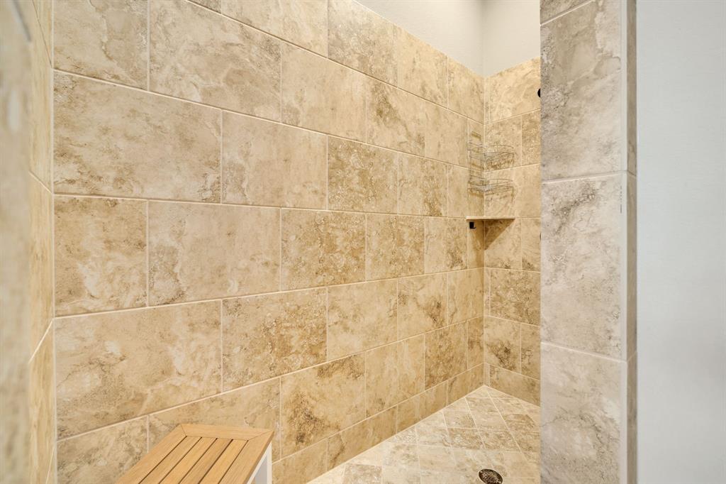 409 George Hopper Road Midlothian, TX 76065 - Photo 23 of 26 a bathroom with a shower