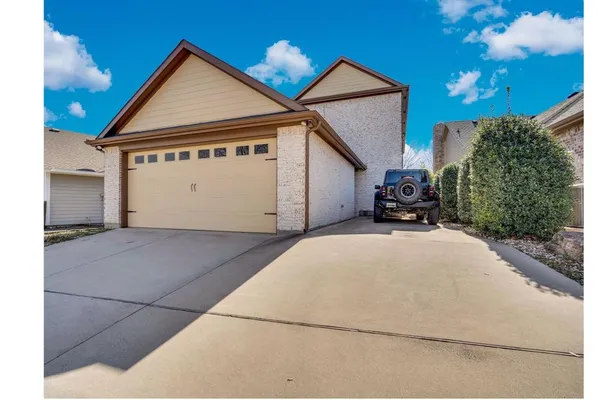 a view of garage and deck