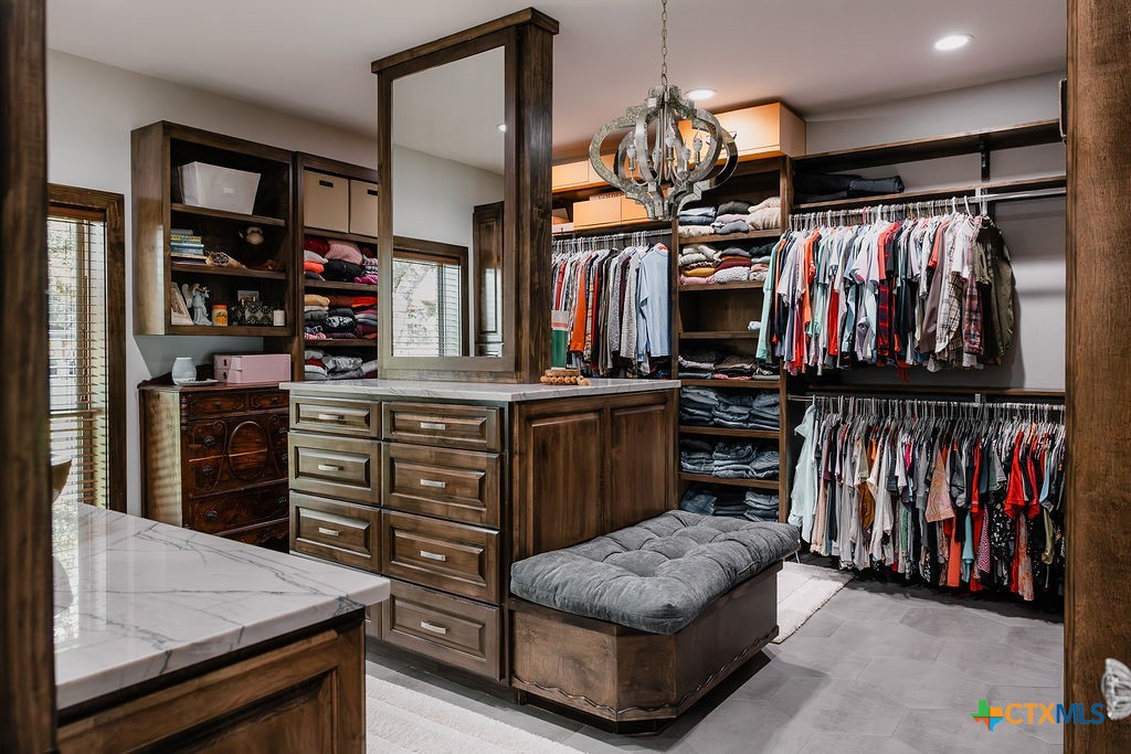 436 Jentry Road Inez, TX 77968 - Photo 13 of 42 a kitchen with stainless steel appliances granite countertop a stove and cabinets