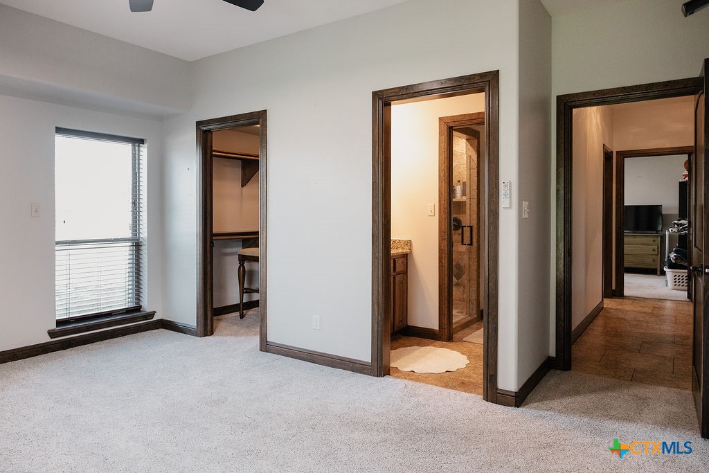 436 Jentry Road Inez, TX 77968 - Photo 19 of 42 a view of an empty room with a fireplace and a window