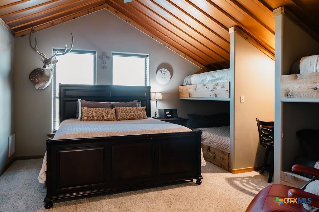 436 Jentry Road Inez, TX 77968 - Photo 22 of 42 a bedroom with a bed and a television