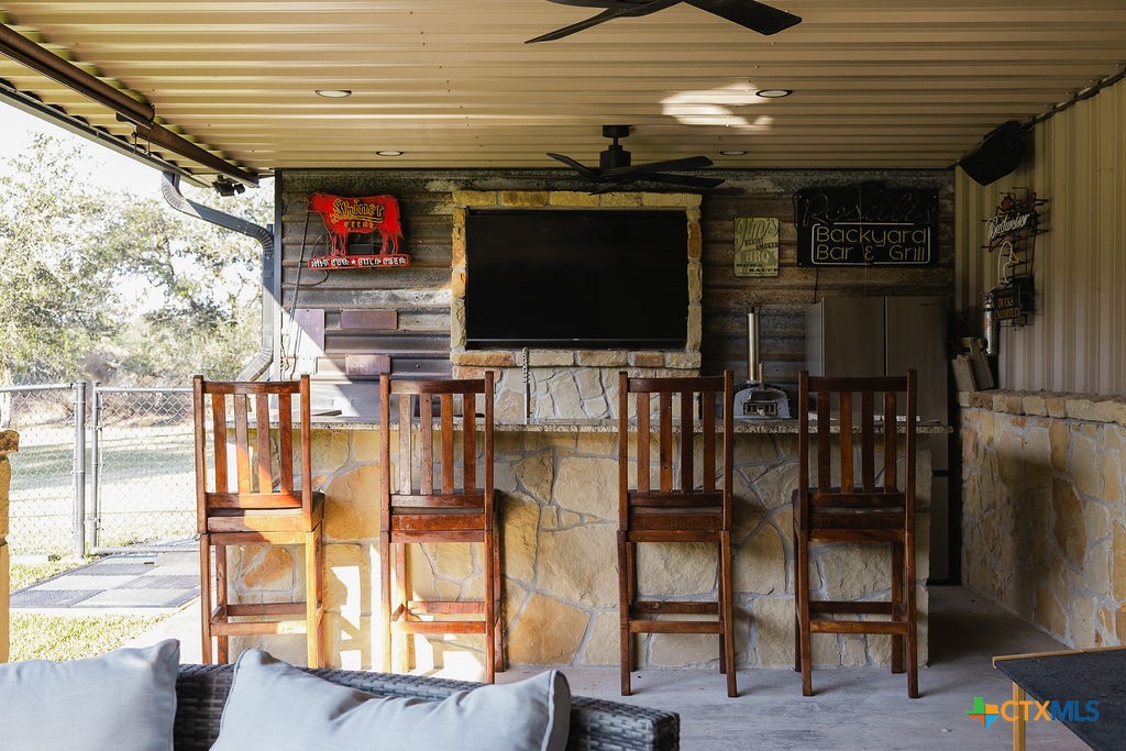 436 Jentry Road Inez, TX 77968 - Photo 25 of 42 a living room with stainless steel appliances furniture and a flat screen tv