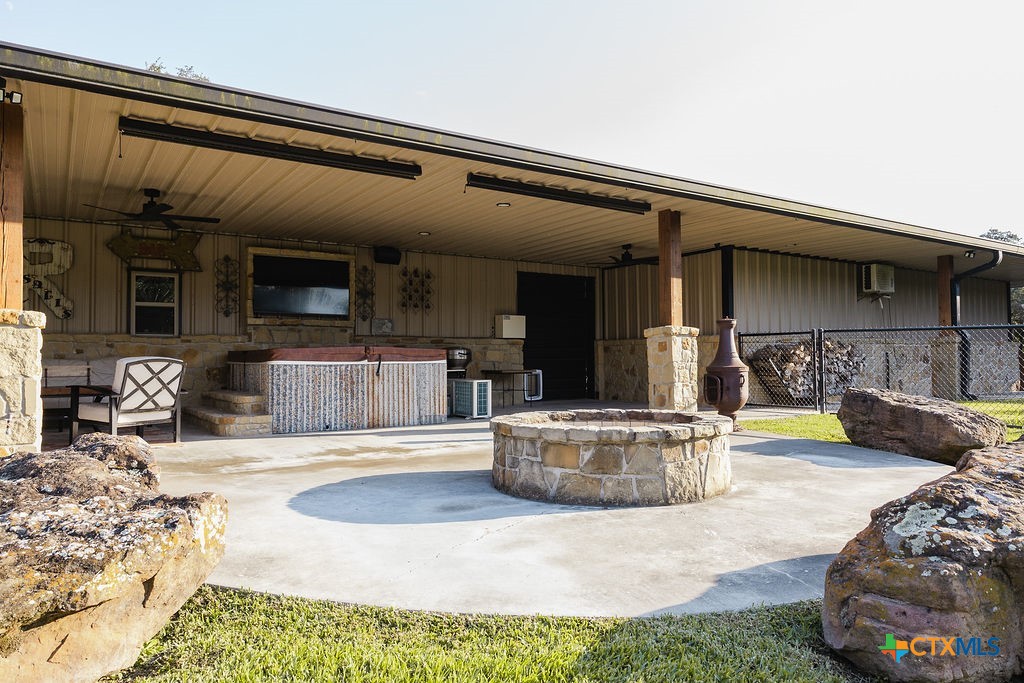 436 Jentry Road Inez, TX 77968 - Photo 27 of 42 a living room with furniture and a wooden floor
