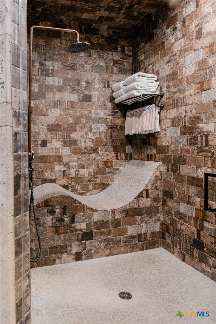 436 Jentry Road Inez, TX 77968 - Photo 8 of 42 a bathroom with a shower and a sink