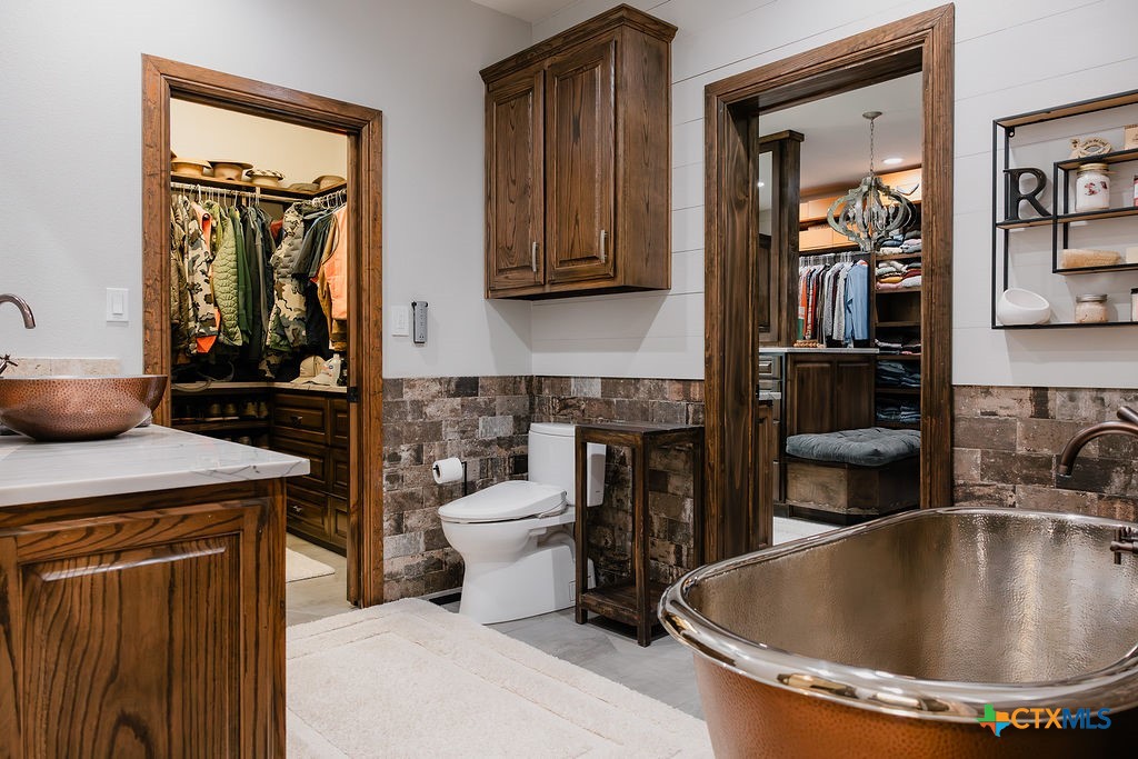 436 Jentry Road Inez, TX 77968 - Photo 9 of 42 a kitchen with a sink and a stove top oven