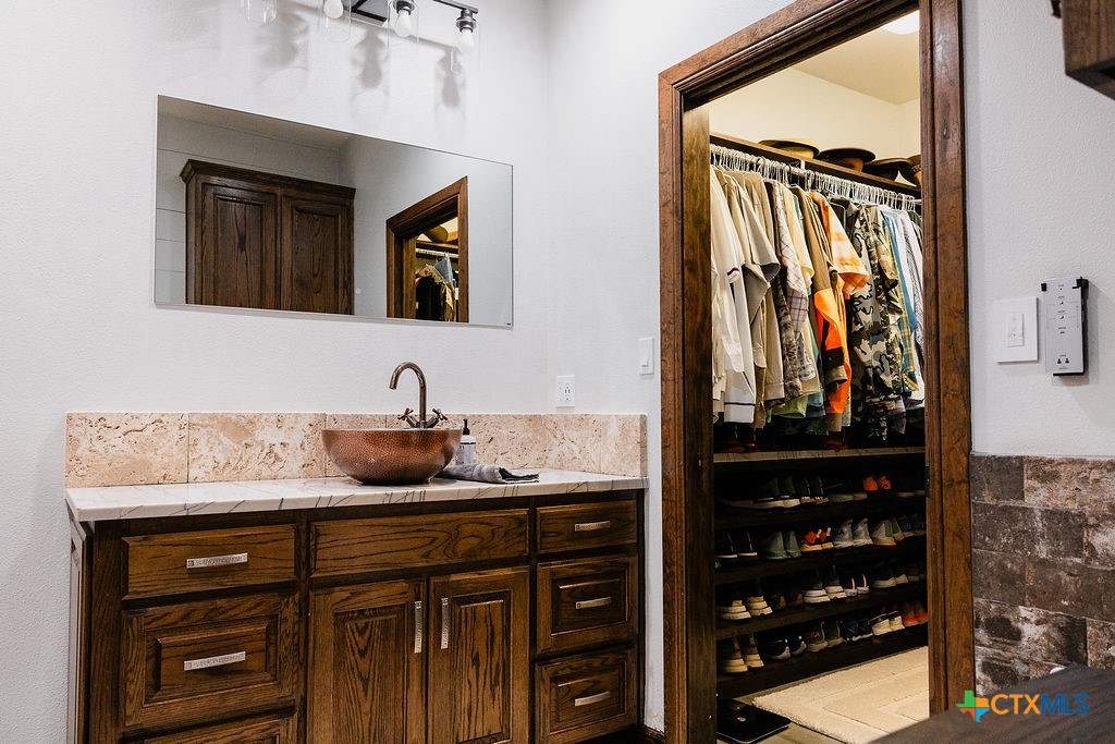436 Jentry Road Inez, TX 77968 - Photo 10 of 42 a bathroom with a sink and a mirror